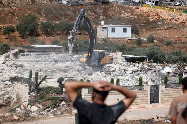 Israeli forces demolish two-story Palestinian house in East Jerusalem EAST JERUSALEM - AUGUST 17: A view of the damage and rubble after Israeli forces demolished a two-story Palestinian-owned residential building in Qalandiya town, northwest of East Jerusalem, on August 17, 2026. The demolition left at least 15 Palestinians homeless. Issam Rimawi Anadolu Jerusalem Israel. Editorial use only. Please get in touch for any other usage.  Copyright: x2026xAnadoluxIssamxRimawix