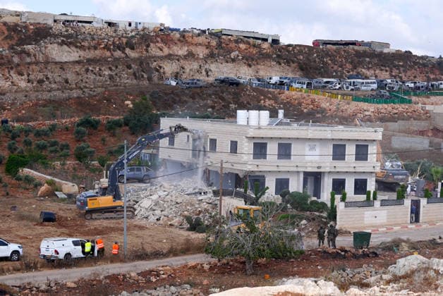 Israeli forces demolish two-story Palestinian house in East Jerusalem EAST JERUSALEM - AUGUST 17: A view of the damage and rubble after Israeli forces demolished a two-story Palestinian-owned residential building in Qalandiya town, northwest of East Jerusalem, on August 17, 2026. The demolition left at least 15 Palestinians homeless. Issam Rimawi Anadolu Jerusalem Israel. Editorial use only. Please get in touch for any other usage.  Copyright: x2026xAnadoluxIssamxRimawix