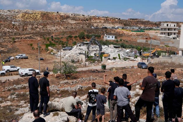 Israeli forces demolish two-story Palestinian house in East Jerusalem EAST JERUSALEM - AUGUST 17: Palestinians inspect the damage and rubble after Israeli forces demolished a two-story Palestinian-owned residential building in Qalandiya town, northwest of East Jerusalem, on August 17, 2026. The demolition left at least 15 Palestinians homeless. Issam Rimawi Anadolu Jerusalem Israel. Editorial use only. Please get in touch for any other usage.  Copyright: x2026xAnadoluxIssamxRimawix
