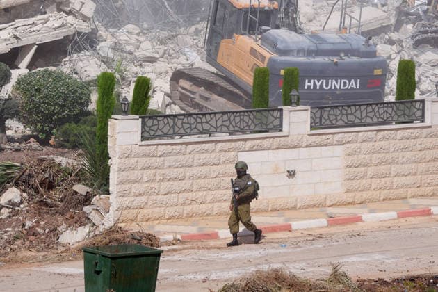 Israeli forces demolish two-story Palestinian house in East Jerusalem EAST JERUSALEM - AUGUST 17: Israeli soldiers take security measures as a two-story Palestinian-owned home is demolished in Qalandiya town, northwest of East Jerusalem, on August 17, 2026. The demolition carried out by Israeli forces left at least 15 Palestinians homeless. Issam Rimawi Anadolu Jerusalem Israel. Editorial use only. Please get in touch for any other usage.  Copyright: x2026xAnadoluxIssamxRimawix
