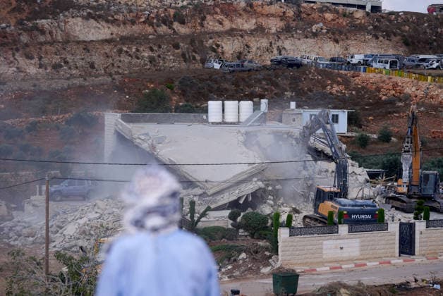 Israeli forces demolish two-story Palestinian house in East Jerusalem EAST JERUSALEM - AUGUST 17: Palestinians inspect the damage and rubble after Israeli forces demolished a two-story Palestinian-owned residential building in Qalandiya town, northwest of East Jerusalem, on August 17, 2026. The demolition left at least 15 Palestinians homeless. Issam Rimawi Anadolu Jerusalem Israel. Editorial use only. Please get in touch for any other usage.  Copyright: x2026xAnadoluxIssamxRimawix