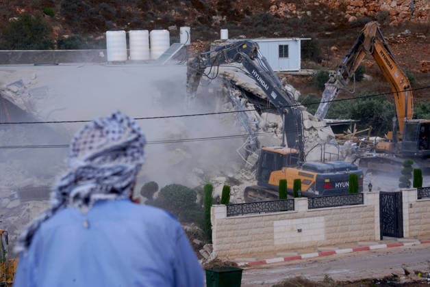 Israeli forces demolish two-story Palestinian house in East Jerusalem EAST JERUSALEM - AUGUST 17: Palestinians inspect the damage and rubble after Israeli forces demolished a two-story Palestinian-owned residential building in Qalandiya town, northwest of East Jerusalem, on August 17, 2026. The demolition left at least 15 Palestinians homeless. Issam Rimawi Anadolu Jerusalem Israel. Editorial use only. Please get in touch for any other usage.  Copyright: x2026xAnadoluxIssamxRimawix