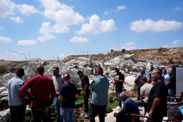 Israeli forces demolish two-story Palestinian house in East Jerusalem EAST JERUSALEM - AUGUST 17: Palestinians inspect the damage and rubble after Israeli forces demolished a two-story Palestinian-owned residential building in Qalandiya town, northwest of East Jerusalem, on August 17, 2026. The demolition left at least 15 Palestinians homeless. Issam Rimawi Anadolu Jerusalem Israel. Editorial use only. Please get in touch for any other usage.  Copyright: x2026xAnadoluxIssamxRimawix