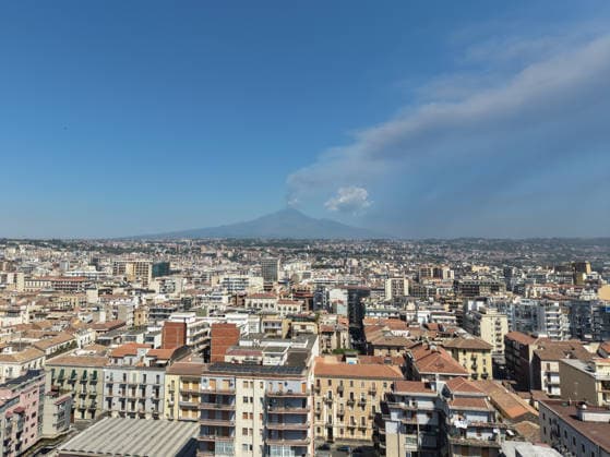 IPA87568814 - Catania, August 17, 2026: View of Mount Etna from Catania during the eruption, smoke, and a panoramic view of the city of Catania  Copyright: xx xx 87568814.jpeg