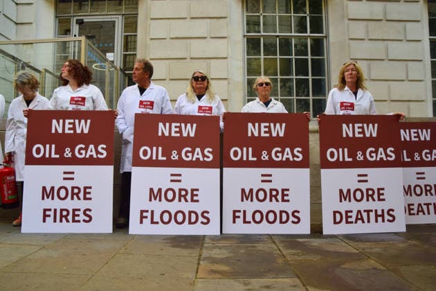 August 17, 2026, London, England, United Kingdom: Climate activists from the group Scientists On Survival stand outside the Department for Energy Security and Net Zero (DESNZ) in Westminster with placards in protest against Rosebank, as the public consulation on the North Sea oil and gas field concludes. London United Kingdom - ZUMAv130 20260817_zip_v130_025 Copyright: xVukxValcicx