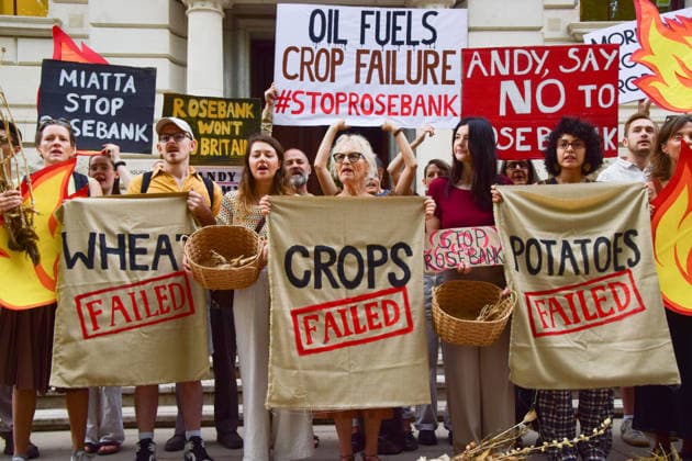 August 17, 2026, London, England, United Kingdom: Climate activists from the group Fossil Free London gather outside the Treasury in Westminster in protest against Rosebank, as the public consulation on the North Sea oil and gas field concludes. The activists highlighted crop failures amidst the ongoing drought, heatwaves and fires. London United Kingdom - ZUMAv130 20260817_zip_v130_037 Copyright: xVukxValcicx