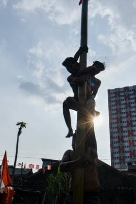 August 17, 2026, Bandung Regency, West Java, Indonesia: Participants climb a pole coated in oil and mud, with prizes placed at the top, during a competition locally known as Panjat Pinang to commemorate the 81st anniversary of the Republic of Indonesia s independence in Lengkong Village, Bandung Regency, Indonesia. Bandung Regency Indonesia  - ZUMAr272 20260817_zip_r272_020 Copyright: xDimasxRachmatsyahx