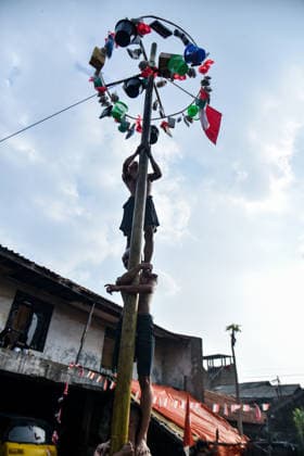 August 17, 2026, Bandung Regency, West Java, Indonesia: Participants climb a pole coated in oil and mud, with prizes placed at the top, during a competition locally known as Panjat Pinang to commemorate the 81st anniversary of the Republic of Indonesia s independence in Lengkong Village, Bandung Regency, Indonesia. Bandung Regency Indonesia - ZUMAr272 20260817_zip_r272_022 Copyright: xDimasxRachmatsyahx