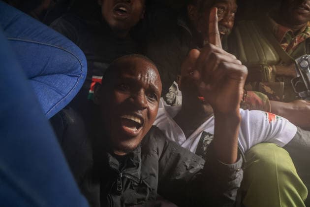 Demonstrators protest police conduct and disappearances in Kenya NAIROBI, KENYA - AUGUST 17: Police officers detain activists during a protest outside the National Police Service headquarters in Nairobi, Kenya, on August 17, 2026. Demonstrators gathered to protest cases of brutality and enforced disappearances, calling for the resignation of Kenya s Inspector General of Police Douglas Kanja and demanding investigations into unresolved cases involving missing persons. Lucas Mukasa Anadolu Nairobi Kenya. Editorial use only. Please get in touch for any other usage.  Copyright: x2026xAnadoluxLucasxMukasax
