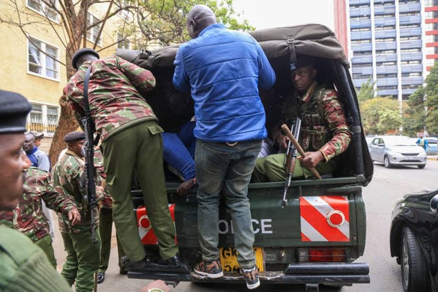 Demonstrators protest police conduct and disappearances in Kenya NAIROBI, KENYA - AUGUST 17: Police officers detain activists during a protest outside the National Police Service headquarters in Nairobi, Kenya, on August 17, 2026. Demonstrators gathered to protest cases of brutality and enforced disappearances, calling for the resignation of Kenya s Inspector General of Police Douglas Kanja and demanding investigations into unresolved cases involving missing persons. Lucas Mukasa Anadolu Nairobi Kenya. Editorial use only. Please get in touch for any other usage.  Copyright: x2026xAnadoluxLucasxMukasax
