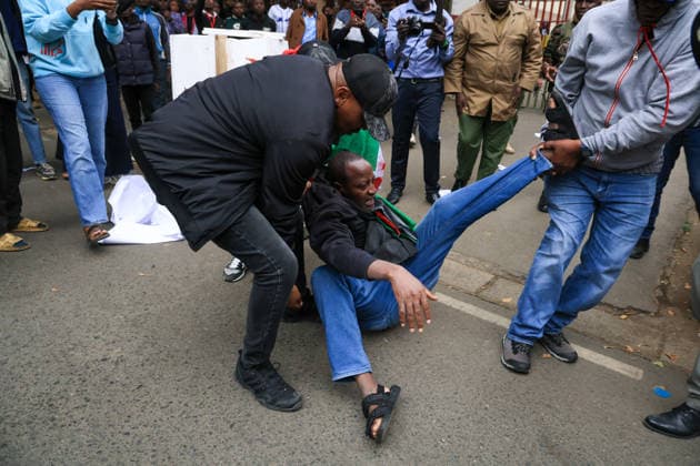 Demonstrators protest police conduct and disappearances in Kenya NAIROBI, KENYA - AUGUST 17: Police officers detain activists during a protest outside the National Police Service headquarters in Nairobi, Kenya, on August 17, 2026. Demonstrators gathered to protest cases of brutality and enforced disappearances, calling for the resignation of Kenya s Inspector General of Police Douglas Kanja and demanding investigations into unresolved cases involving missing persons. Lucas Mukasa Anadolu Nairobi Kenya. Editorial use only. Please get in touch for any other usage.  Copyright: x2026xAnadoluxLucasxMukasax