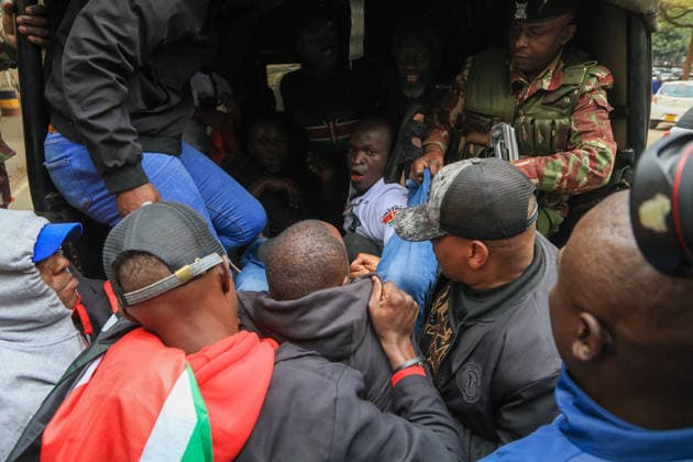 Demonstrators protest police conduct and disappearances in Kenya NAIROBI, KENYA - AUGUST 17: Police officers detain activists during a protest outside the National Police Service headquarters in Nairobi, Kenya, on August 17, 2026. Demonstrators gathered to protest cases of brutality and enforced disappearances, calling for the resignation of Kenya s Inspector General of Police Douglas Kanja and demanding investigations into unresolved cases involving missing persons. Lucas Mukasa Anadolu Nairobi Kenya. Editorial use only. Please get in touch for any other usage.  Copyright: x2026xAnadoluxLucasxMukasax