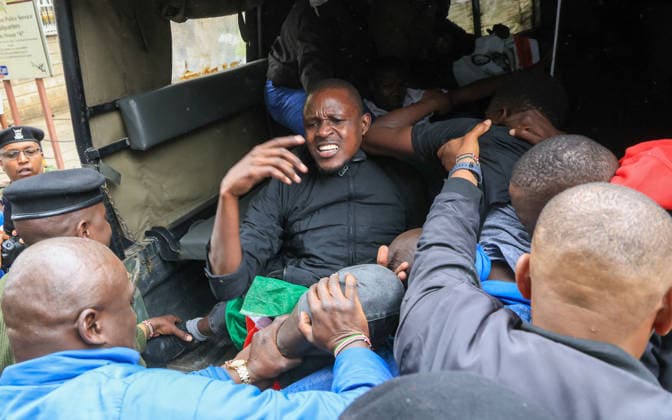 Demonstrators protest police conduct and disappearances in Kenya NAIROBI, KENYA - AUGUST 17: Police officers detain activists during a protest outside the National Police Service headquarters in Nairobi, Kenya, on August 17, 2026. Demonstrators gathered to protest cases of brutality and enforced disappearances, calling for the resignation of Kenya s Inspector General of Police Douglas Kanja and demanding investigations into unresolved cases involving missing persons. Lucas Mukasa Anadolu Nairobi Kenya. Editorial use only. Please get in touch for any other usage.  Copyright: x2026xAnadoluxLucasxMukasax