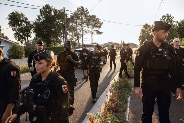 Lecornu Visits Fire-Hit Area As Residents Seek Aid - Le Porge French Prime Minister Sebastien Lecornu arrives at a gathering of wildfire victims dressed in black in Le Porge, Gironde, France on August 17, 2026, after the meeting location was moved from the town hall to the fire station where he was in discussion with local mayor Martial Zaninetti, while residents hoped for updates on aid measures before he departed without meeting them. Gendarmes are present at the scene. Photo by Gardelle M ANDBZ ABACAPRESS.COM Le Porge Nouvelle-Aquitaine France  Copyright: xANDBZ ABACAx