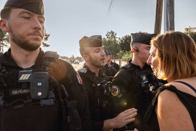 Lecornu Visits Fire-Hit Area As Residents Seek Aid - Le Porge French Prime Minister Sebastien Lecornu arrives at a gathering of wildfire victims dressed in black in Le Porge, Gironde, France on August 17, 2026, after the meeting location was moved from the town hall to the fire station where he was in discussion with local mayor Martial Zaninetti, while residents hoped for updates on aid measures before he departed without meeting them. Gendarmes are present at the scene. Photo by Gardelle M ANDBZ ABACAPRESS.COM Le Porge Nouvelle-Aquitaine France  Copyright: xANDBZ ABACAx