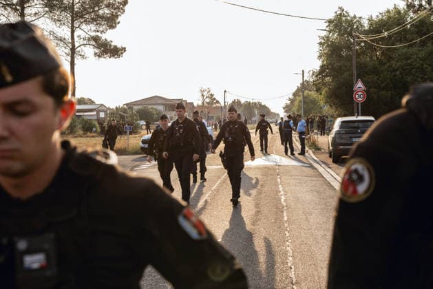 Lecornu Visits Fire-Hit Area As Residents Seek Aid - Le Porge French Prime Minister Sebastien Lecornu arrives at a gathering of wildfire victims dressed in black in Le Porge, Gironde, France on August 17, 2026, after the meeting location was moved from the town hall to the fire station where he was in discussion with local mayor Martial Zaninetti, while residents hoped for updates on aid measures before he departed without meeting them. Gendarmes are present at the scene. Photo by Gardelle M ANDBZ ABACAPRESS.COM Le Porge Nouvelle-Aquitaine France  Copyright: xANDBZ ABACAx
