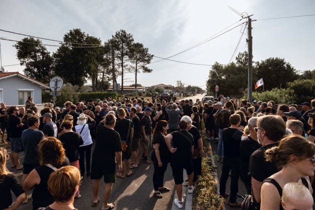 Lecornu Visits Fire-Hit Area As Residents Seek Aid - Le Porge French Prime Minister Sebastien Lecornu arrives at a gathering of wildfire victims dressed in black in Le Porge, Gironde, France on August 17, 2026, after the meeting location was moved from the town hall to the fire station where he was in discussion with local mayor Martial Zaninetti, while residents hoped for updates on aid measures before he departed without meeting them. Photo by Gardelle M ANDBZ ABACAPRESS.COM Le Porge Nouvelle-Aquitaine France  Copyright: xANDBZ ABACAx