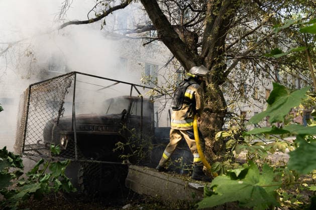August 17, 2026, Kramatorsk, Donetsk Oblast, Ukraine: Ukrainian firefighters extinguish burning vehicles following a Russian FPV drone strike in a residential neighbourhood. The attack comes as Russia intensifies its use of drones across the Donetsk region, in Kramatorsk, Donetsk Oblast, Ukraine. Kramatorsk Ukraine  - ZUMAm350 20260817_zip_m350_009 Copyright: xCameronxJones-Manleyx