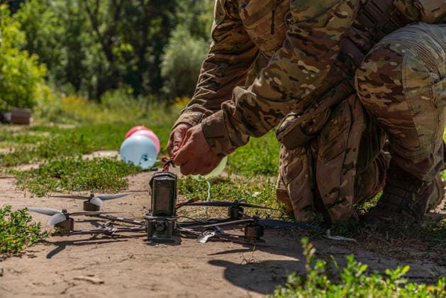 Khartiia brigade trains to counter FPV drones on Ukraine s frontline KHARKIV OBLAST, UKRAINE - AUGUST 17: Members of the air defense unit of the Khartiia Brigade demonstrate training against FPV drones in Kharkiv Oblast, Ukraine, on August 17, 2026. Soldiers attach balloons to FPV drones and practice shooting them down during the exercise. The training aims to improve the ability of air defense and infantry personnel to counter FPV drones in real combat situations along the front lines. Carlo Bravo Anadolu Kharkiv Ukraine. Editorial use only. Please get in touch for any other usage.  Copyright: x2026xAnadoluxCarloxBravox