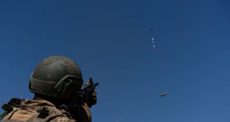 Khartiia brigade trains to counter FPV drones on Ukraine s frontline KHARKIV OBLAST, UKRAINE - AUGUST 17: Members of the air defense unit of the Khartiia Brigade demonstrate training against FPV drones in Kharkiv Oblast, Ukraine, on August 17, 2026. Soldiers attach balloons to FPV drones and practice shooting them down during the exercise. The training aims to improve the ability of air defense and infantry personnel to counter FPV drones in real combat situations along the front lines. Carlo Bravo Anadolu Kharkiv Ukraine. Editorial use only. Please get in touch for any other usage.  Copyright: x2026xAnadoluxCarloxBravox