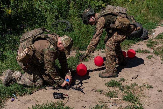 Khartiia brigade trains to counter FPV drones on Ukraine s frontline KHARKIV OBLAST, UKRAINE - AUGUST 17: Members of the air defense unit of the Khartiia Brigade demonstrate training against FPV drones in Kharkiv Oblast, Ukraine, on August 17, 2026. Soldiers attach balloons to FPV drones and practice shooting them down during the exercise. The training aims to improve the ability of air defense and infantry personnel to counter FPV drones in real combat situations along the front lines. Carlo Bravo Anadolu Kharkiv Ukraine. Editorial use only. Please get in touch for any other usage.  Copyright: x2026xAnadoluxCarloxBravox