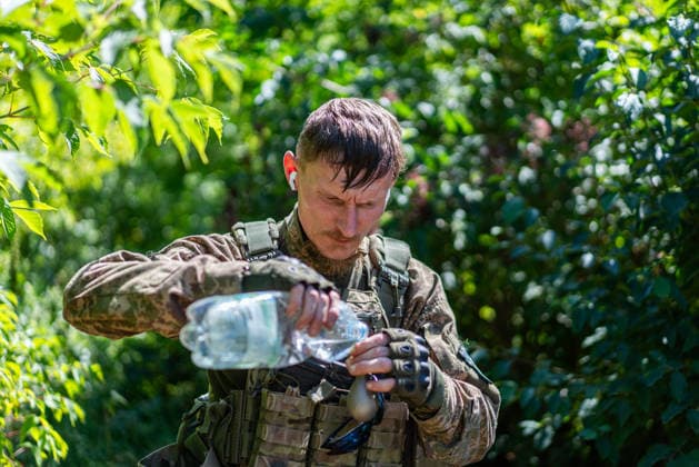 Khartiia brigade trains to counter FPV drones on Ukraine s frontline KHARKIV OBLAST, UKRAINE - AUGUST 17: Members of the air defense unit of the Khartiia Brigade demonstrate training against FPV drones in Kharkiv Oblast, Ukraine, on August 17, 2026. Soldiers attach balloons to FPV drones and practice shooting them down during the exercise. The training aims to improve the ability of air defense and infantry personnel to counter FPV drones in real combat situations along the front lines. Carlo Bravo Anadolu Kharkiv Ukraine. Editorial use only. Please get in touch for any other usage.  Copyright: x2026xAnadoluxCarloxBravox