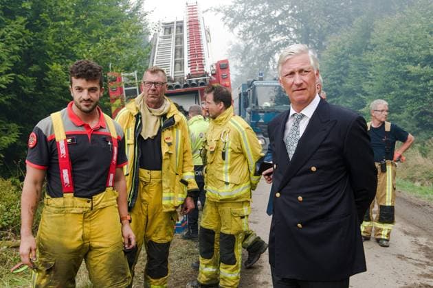 King Philippe - Filip of Belgium pictured at a visit on the field of from the command center in Sourbrodt, as fire rages in the Hautes Fagnes (High Fens) nature reserve, on Monday 17 August 2026. The fire started on August 14th and 3000 hectares (on a total of 4500) are impacted. POOL  NICOLASxLAMBERT 183612543