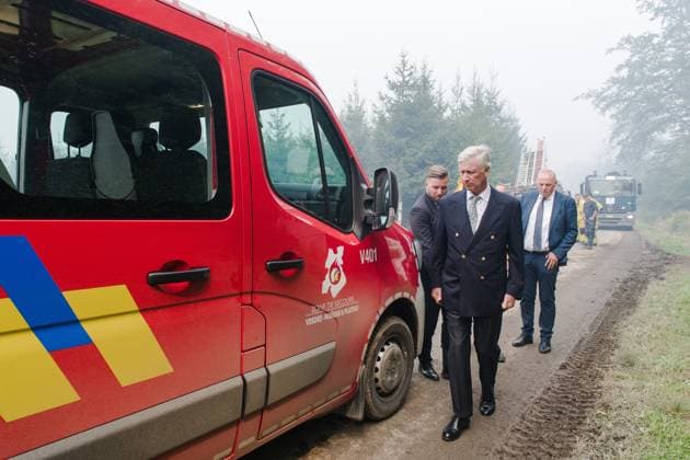 King Philippe - Filip of Belgium pictured a visit of Belgian king at the command center in Sourbrodt, as fire rages in the Hautes Fagnes (High Fens) nature reserve, on Monday 17 August 2026. The fire started on August 14th and 3000 hectares (on a total of 4500) are impacted. POOL  NICOLASxLAMBERT 183612586