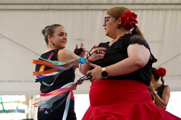 Scene at the 2026 Málaga Fair: Several women, dressed in traditional flamenco outfits, stroll through the Cortijo de Torres grounds during the Málaga Fair. August 17, 2026, in Málaga, Andalusia, Spain. The capital of the Costa del Sol celebrates its big week, during which locals and visitors gather to enjoy the festive atmosphere and the many activities the Feria has to offer. August 17, 2026, in Málaga, Andalusia, Spain Málaga, Andalusia, Spain Spain  Copyright: xÃlexxZeax 7718773