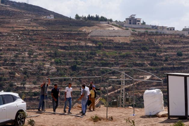 Three Palestinian families face restrictions in West Bank NABLUS, WEST BANK, PALESTINE - AUGUST 17: Israeli settlers have surrounded homes belonging to three Palestinian families for nine days in the Ras al-Ayn area of Qusra town, near Nablus, West Bank, Palestine on August 17, 2026. Access to food, water and basic necessities has been blocked for the homes, where approximately 13 Palestinians live. Issam H.s. Alasmar Anadolu Nablus West Bank. Editorial use only. Please get in touch for any other usage.  Copyright: x2026xAnadoluxIssamxH.s.xAlasmarx