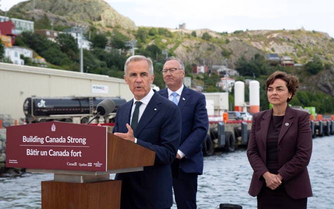 August 17, 2026, St. John s, Nl, CANADA: Prime Minister Mark Carney takes questions from the media as Newfoundland and Labrador Premier Tony Wakeham, centre, and Quebec Premier Christine Frechette look on, following the announcement of a new agreement on the Churchill Falls generating station and the launch of new hydro, wind and transmission projects, in St. John s, N.L., on Monday, Aug. 17, 2026. St. John s CANADA  - ZUMAc35_ 20260817_zaf_c35_009 Copyright: xPaulxDalyx