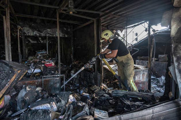 Aftermath Of A Russian Ballistic Missile Strike On Ukraine s Largest Book Market In Ukraine A firefighter works to extinguish remaining hotspots at Ukraine s largest book market in Kyiv, Ukraine, on August 17, 2026, following a fire caused by a Russian ballistic missile attack on the city overnight on August 16. Kyiv Ukraine  Copyright: xMaxymxMarusenkox originalFilename: musiienko-notitle260817_npIJG.jpg
