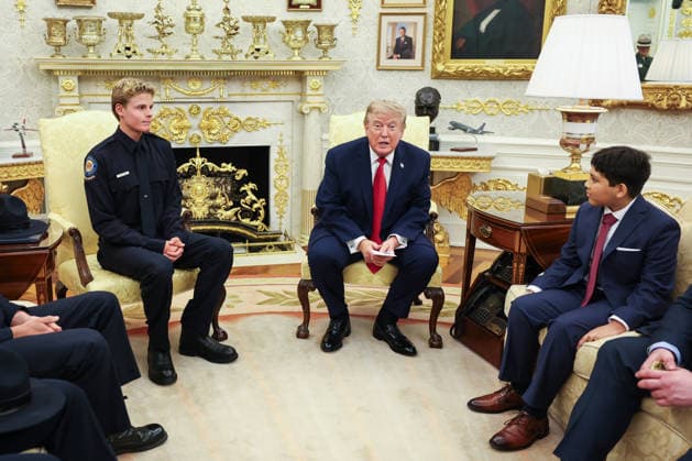 August 17, 2026, Washington, District Of Columbia, USA: United States President Donald J Trump hosts Lifeguard Ryder Williams (left) in the Oval Office of the White House in Washington, DC on August 17, 2026. Ryder Williams, a 16-year-old lifeguard, saved the life of 10-year-old Nathaniel Rai (right) at Seabright Beach in Santa Cruz, California, on July 25 Washington USA - ZUMAs152 20260817_faa_s152_013 Copyright: xSamuelxCorumx-xPoolxviaxCNPx