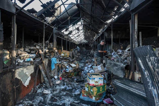 Aftermath Of A Russian Ballistic Missile Strike On Ukraine s Largest Book Market In Ukraine Owners of shops salvage books and other belongings from the debris at Ukraine s largest book market in Kyiv, Ukraine, on August 17, 2026, following a fire caused by a Russian ballistic missile attack on the city overnight on August 16. Kyiv Ukraine  Copyright: xMaxymxMarusenkox originalFilename: musiienko-notitle260817_npH3f.jpg