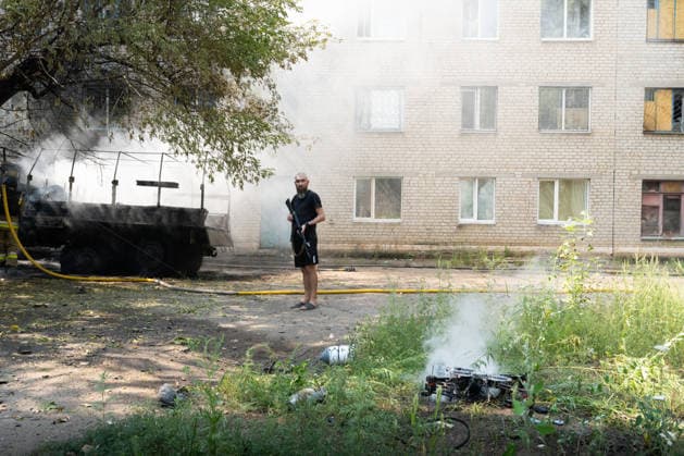 August 17, 2026, Kramatorsk, Donetsk Oblast, Ukraine: Ukrainian firefighters extinguish burning vehicles following a Russian FPV drone strike in a residential neighbourhood. The attack comes as Russia intensifies its use of drones across the Donetsk region, in Kramatorsk, Donetsk Oblast, Ukraine. Kramatorsk Ukraine - ZUMAm350 20260817_zip_m350_013 Copyright: xCameronxJones-Manleyx