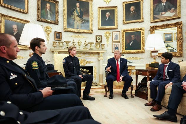 July 23, 2026, Washington, District Of Columbia, USA: United States President Donald J Trump hosts Lifeguard Ryder Williams (second from the left) in the Oval Office of the White House in Washington, DC on August 17, 2026. Ryder Williams, a 16-year-old lifeguard, saved the life of 10-year-old Nathaniel Rai (second from the right) at Seabright Beach in Santa Cruz, California, on July 25. .SAMUEL CORUM POOL CNP PI Washington USA - ZUMAp124 20260723_zaa_p124_015 Copyright: xSamuelxCorumx