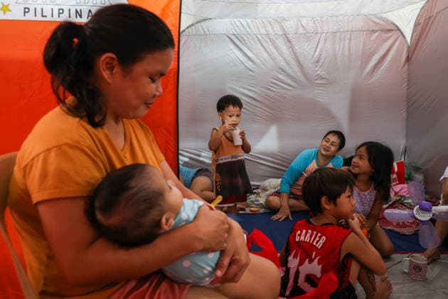 Tens of thousands evacuated in Philippines amid monsoon rains, floods QUEZON CITY, PHILIPPINES - AUGUST 18: People evacuated from flooded areas take shelter at a secondary school basketball court, amid lingering threats of flooding caused by heavy monsoon rains, in Quezon City, Metro Manila, Philippines, on August 18, 2026. As the country remains threatened by floods caused by monsoon heavy rains, tens of thousands of people in the capital region of Metro Manila and its surrounding cities and areas have been evacuated, with schools in multiple locations across the Philippines being suspended for safety reasons. Daniel Ceng Anadolu Quezon City Philippines. Editorial use only. Please get in touch for any other usage.  Copyright: x2026xAnadoluxDanielxCengx