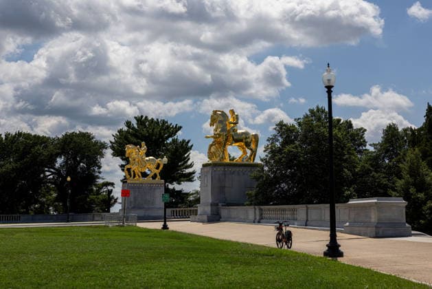 Trump administration covers Washington s Arts of War statues in gold leaf WASHINGTON, D.C., UNITED STATES - AUGUST 17: The Arts of War equestrian statues, newly covered in gold leaf, are seen at Arlington Memorial Bridge near the Lincoln Memorial in Washington, D.C., on August 17, 2026. The Trump administration has ordered a $5.1 million restoration project to regild the two Arts of War statues, along with the nearby Arts of Peace companion statues. The four statues are being restored under a project overseen by the U.S. Department of the Interior. Mehmet Eser Anadolu Washington United States. Editorial use only. Please get in touch for any other usage.  Copyright: x2026xAnadoluxMehmetxEserx