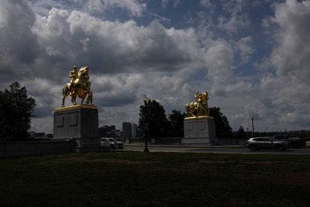 Trump administration covers Washington s Arts of War statues in gold leaf WASHINGTON, D.C., UNITED STATES - AUGUST 17: The Arts of War equestrian statues, newly covered in gold leaf, are seen at Arlington Memorial Bridge near the Lincoln Memorial in Washington, D.C., on August 17, 2026. The Trump administration has ordered a $5.1 million restoration project to regild the two Arts of War statues, along with the nearby Arts of Peace companion statues. The four statues are being restored under a project overseen by the U.S. Department of the Interior. Mehmet Eser Anadolu Washington United States. Editorial use only. Please get in touch for any other usage.  Copyright: x2026xAnadoluxMehmetxEserx