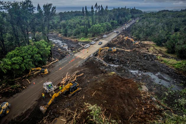 August 17, 2026, Pahala, Hawaii, U.S: Road crews work to clear damage along Highway 11 outside of Pahala, HawaiÃäÂ»i photographed Monday, August 17, 2026. Lala hit the island chain on August 16, 2026 causing widespread wind and flood damage to the island. Sections of Highway 11 and other roads were washed out and thousands are without power, some of whom may not get it back for several weeks. Pahala U.S - ZUMAd149 20260817_zap_d149_003 Copyright: xJamesxD.xDeCampx