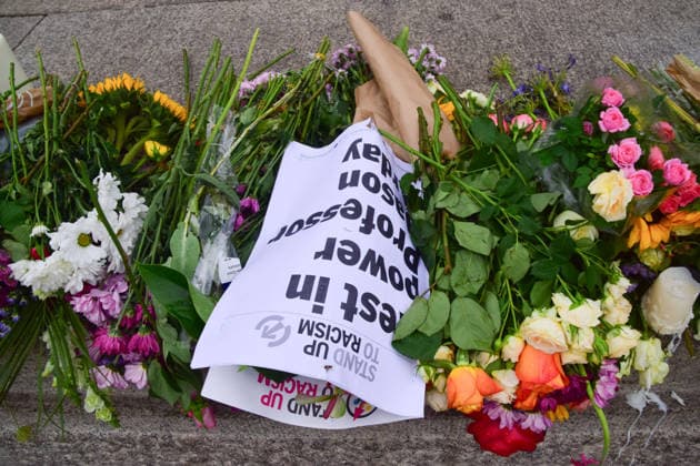 August 18, 2026, London, England, United Kingdom: Floral tributes and Rest In Power placards for Jason Arday have been left at the base of Nelson s Column in Trafalgar Square following a vigil which took place the night before. The former University of Cambridge sociology professor died several days after he resigned following accusations of academic plagiarism and scrutiny of his personal claims. London United Kingdom - ZUMAv130 20260818_zip_v130_013 Copyright: xVukxValcicx