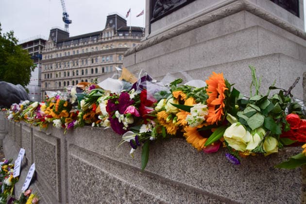 August 18, 2026, London, England, United Kingdom: Floral tributes for Jason Arday have been left at the base of Nelson s Column in Trafalgar Square following a vigil which took place the night before. The former University of Cambridge sociology professor died several days after he resigned following accusations of academic plagiarism and scrutiny of his personal claims. London United Kingdom - ZUMAv130 20260818_zip_v130_014 Copyright: xVukxValcicx