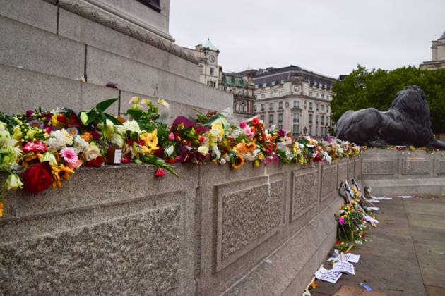 August 18, 2026, London, England, United Kingdom: Floral tributes for Jason Arday have been left at the base of Nelson s Column in Trafalgar Square following a vigil which took place the night before. The former University of Cambridge sociology professor died several days after he resigned following accusations of academic plagiarism and scrutiny of his personal claims. London United Kingdom - ZUMAv130 20260818_zip_v130_016 Copyright: xVukxValcicx
