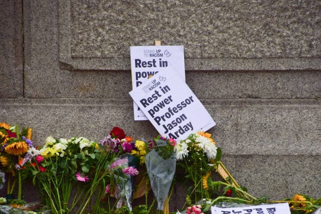 August 18, 2026, London, England, United Kingdom: Floral tributes and Rest In Power placards for Jason Arday have been left at the base of Nelson s Column in Trafalgar Square following a vigil which took place the night before. The former University of Cambridge sociology professor died several days after he resigned following accusations of academic plagiarism and scrutiny of his personal claims. London United Kingdom - ZUMAv130 20260818_zip_v130_020 Copyright: xVukxValcicx