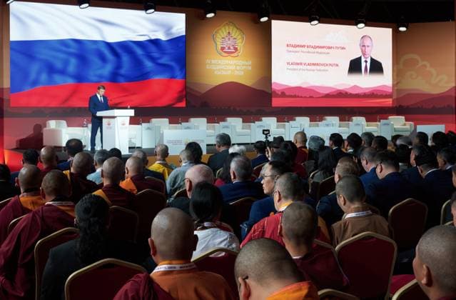 Russia International Buddhist Forum 9223445 18.08.2026 Sergei Gryzykhin, deputy presidential envoy to the Siberian Federal District, reads a welcome telegram of Russian President Vladimir Putin to participants of the 4th International Buddhist Forum Buddhism in Dialogue with Cultures: The Future of Humanity in Kyzyl, the Republic of Tuva, Russia. Alexei Danichev Sputnik Kyzyl Republic of Tuva Russia  Copyright: xAlexeixDanichevx
