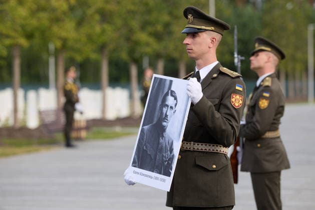 Ukraine holds funeral ceremony for nationalist leader Yevhen Konovalets in Kyiv KYIV, UKRAINE - AUGUST 18: (----EDITORIAL USE ONLY - MANDATORY CREDIT - UKRAINIAN PRESIDENCY HANDOUT - NO MARKETING NO ADVERTISING CAMPAIGNS - DISTRIBUTED AS A SERVICE TO CLIENTS----) A Ukrainian serviceman holds a portrait of Yevhen Konovalets during his funeral and reburial ceremony in Kyiv, Ukraine, on August 18, 2026. Ukrainian Presidency Handout Anadolu Kyiv Ukraine. Editorial use only. Please get in touch for any other usage.  Copyright: x2026xAnadoluxUkrainianxPresidency Handoutx