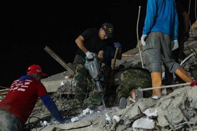 August 18, 2026, La Guaira, Venezuela (Bolivarian Republic of: LA GUAIRA, VENEZUELA Ã¢â‚¬ AUGUST 18, 2026: Emergency teams work among collapsed concrete slabs and twisted steel reinforcement as debris removal and body recovery operations continue at the disaster site in La Guaira, Venezuela, on August 18, 2026. Heavy machinery is being used to remove large sections of concrete and allow crews to search areas that remain difficult to access, as rescue and recovery efforts continue following the earthquakes that struck the region. La Guaira Venezuela (Bolivarian Republic of - ZUMAq101 20260818_zna_q101_028 Copyright: xMarioxFloresx