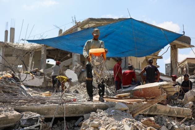 Gaza residents salvage metal from destroyed homesGaza residents salvage metal from destroyed homes KHAN YOUNIS, GAZA STRIP, PALESTINE, AUGUST 18, 2026: Palestinians salvage metal from the rubble of destroyed homes in Khan Younis for reuse in making tents and other items needed for daily life, amid shortages of materials and limited resources in the Gaza Strip. KHAN YOUNIS Palestine, State of Copyright: x xRamzixAbuxAmerx xJNAxPressx