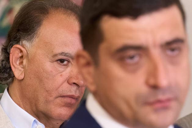 AUR MP Mohammad Murad Proposes Crisis Cell for Romanian Economy and Capital, Bucharest, Romania Bucharest, Romania. 18th Aug, 2026: Businessman Mohammad Murad (L), deputy for the Alliance for the Union of Romanians (AUR) and chairman of the Chamber of Deputies Committee for Entrepreneurship and Tourism, listens to the speech of AUR president George Simion during a press conference at the Chamber of Deputies. Murad proposed the establishment of a Crisis Cell for the Romanian Economy and Capital, requesting that it become operational within 15 days in order to begin delivering concrete, immediately applicable measures to protect Romanian companies, jobs, investments, and domestic capital. Bucharest Romania Copyright: xLucianxAlecux