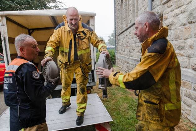Picture of firefighters at the command center of Sourbrodt regarding the fire in the Hautes Fagnes (High Fens) nature reserve, on Tuesday 18 August 2026. The fire started on August 14th and 3000 hectares (on a total of 4500) are impacted.  NICOLASxLAMBERT 183665530